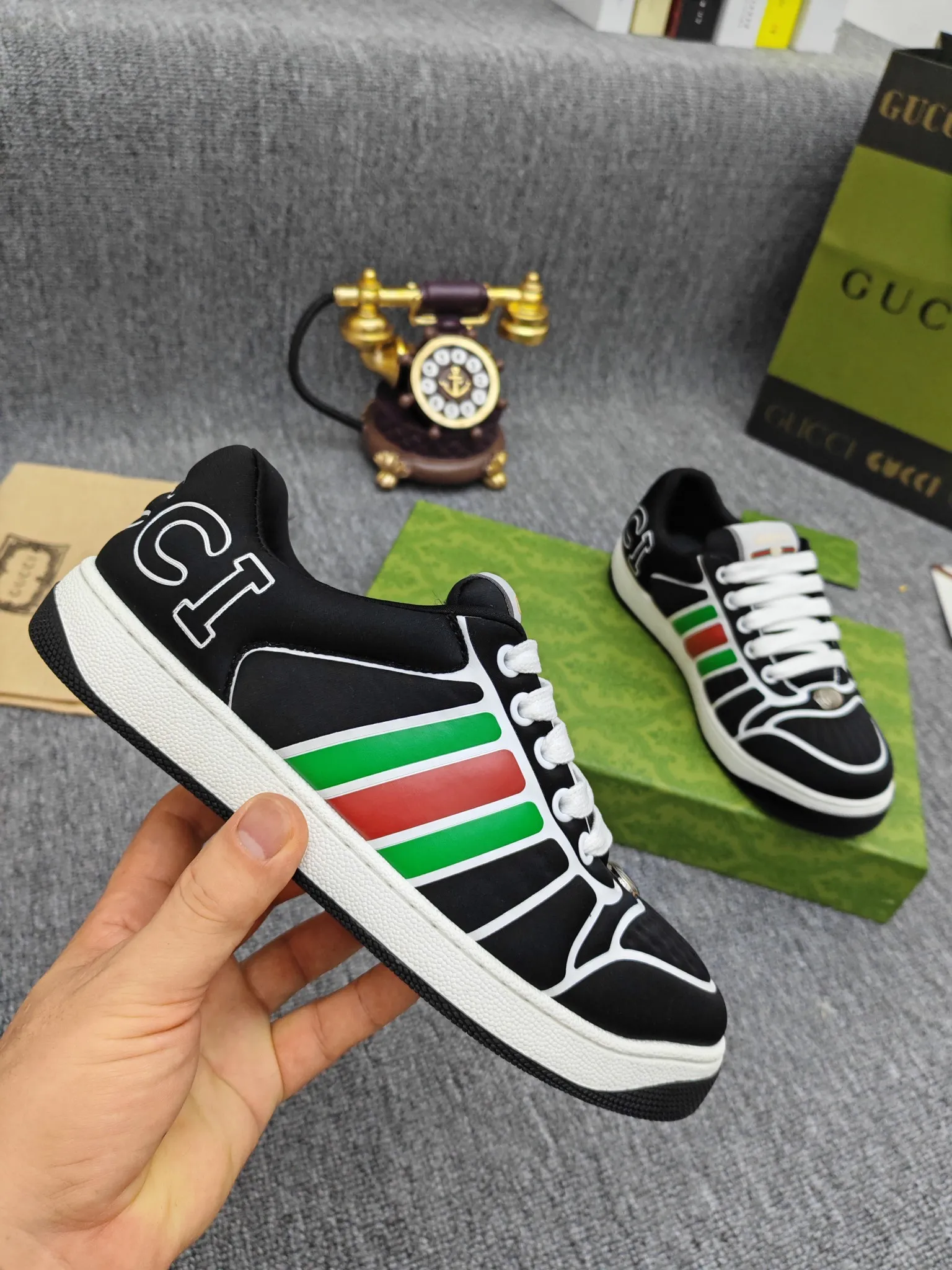Factory price 600💰Screener series embellished web sneakers. This item is from the Gucci Lido series. Its design is inspired by the summer style and beach clubs of the Italian coast. The Screener series of sneakers draws inspiration from classic sneakers from the 1970s and takes its name from a special defensive move in sports. This shoe from the 2024 Pre-Fall collection is crafted from yellow rubber, a technical and malleable opaque material, with striped webbing on the sides and an embossed Gucci printed logo on the heel. Yellow rubber, opaque and technological in appearance. Red and green webbing decorated with metal Double G oval enamel details. Gucci printed embossed logo. Women 35-40, men 38-45, (men 38 and 45 need to be customized)